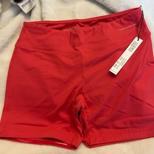 IAB Light Red 3” No slip shorts NWT